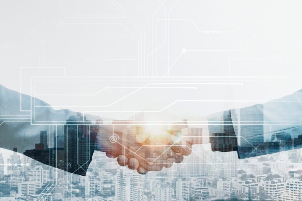 Two bussines partners having a handshake